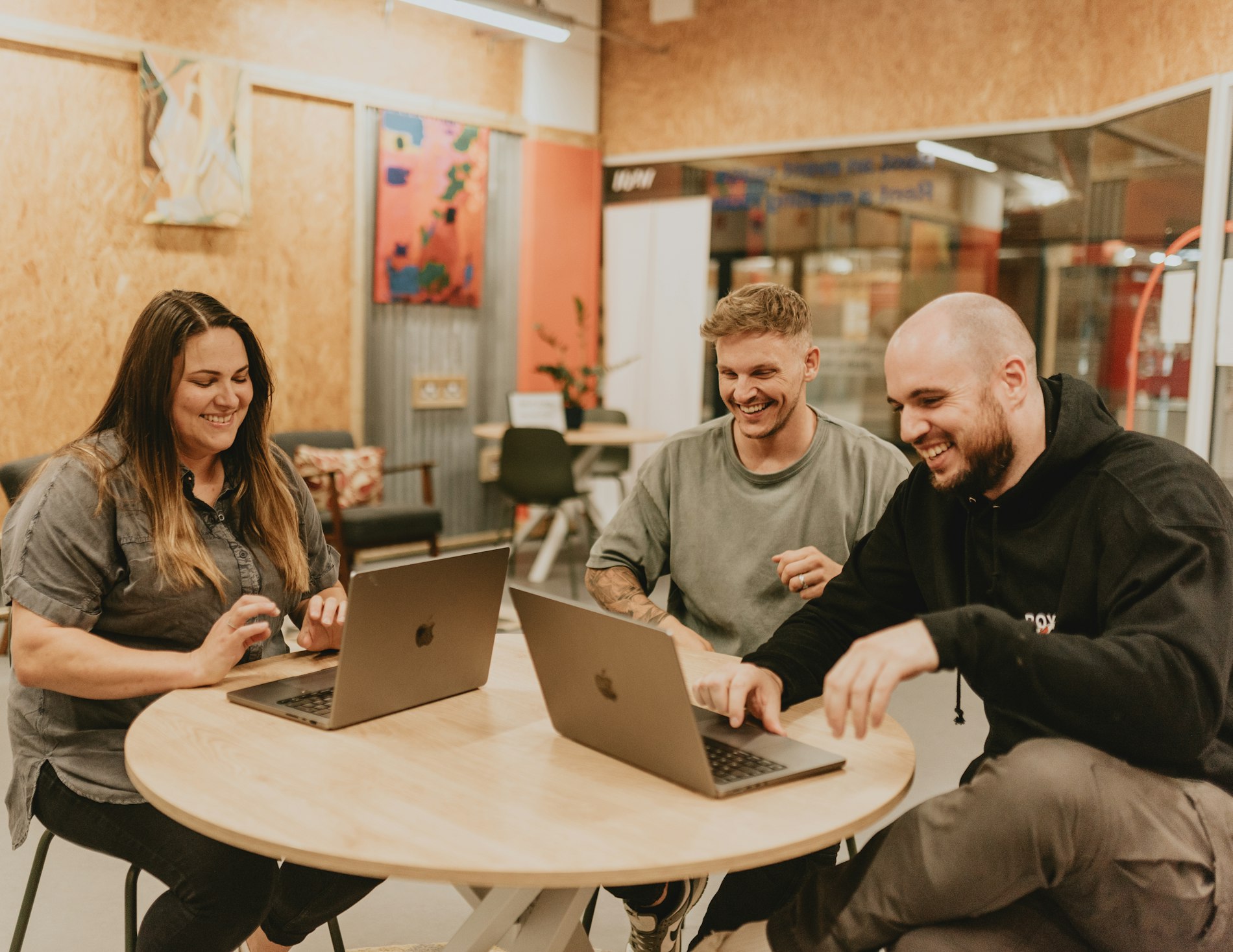 A small team working together at a laptop